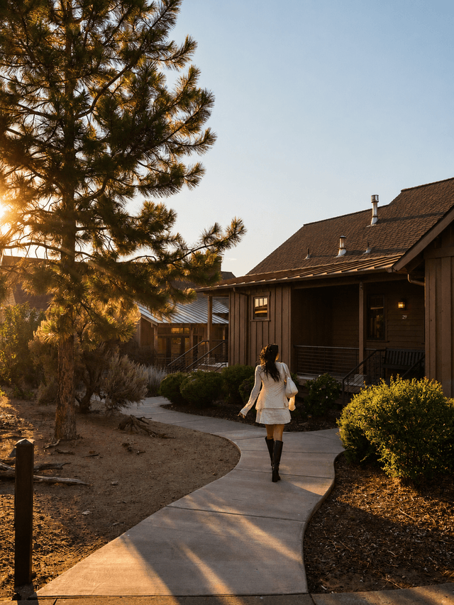 Guest walking toward a cabin at Brasada Ranch