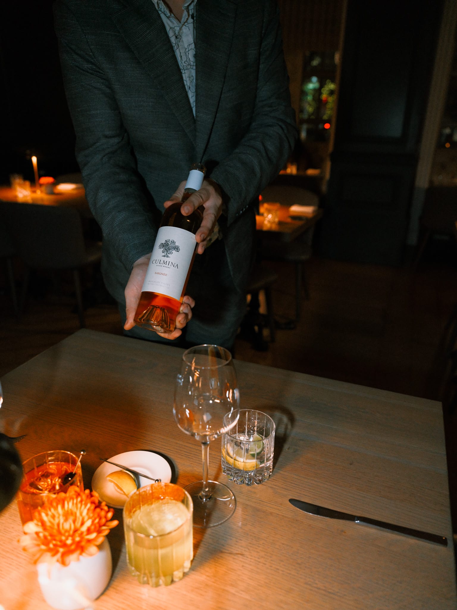 Wine service during dinner at Boulevard Vancouver
