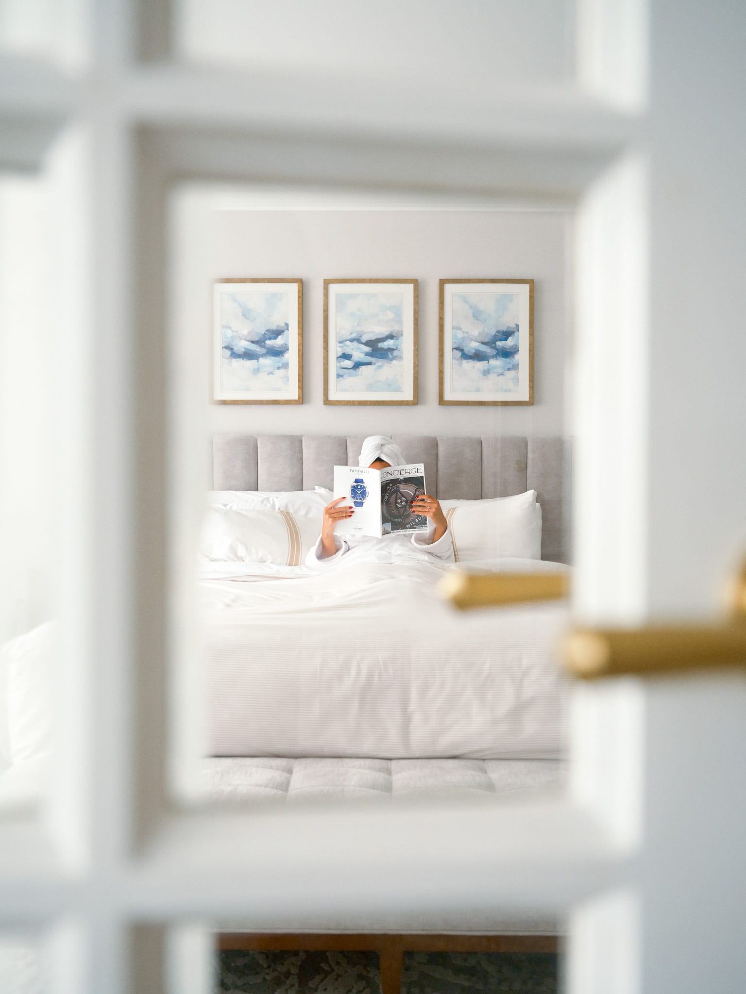 Airy editorial view of a Sutton Place guest room