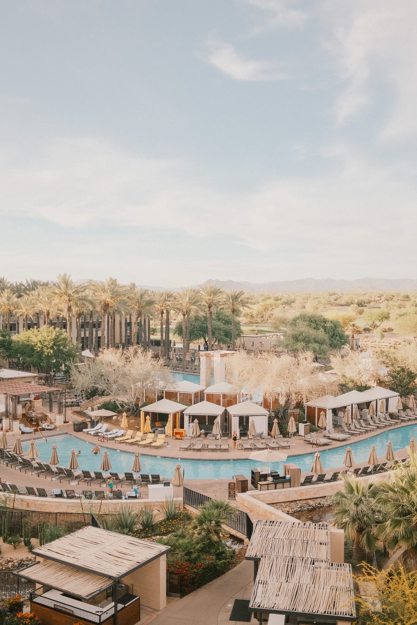 Aerial view across the pools and desert grounds at Desert Ridge