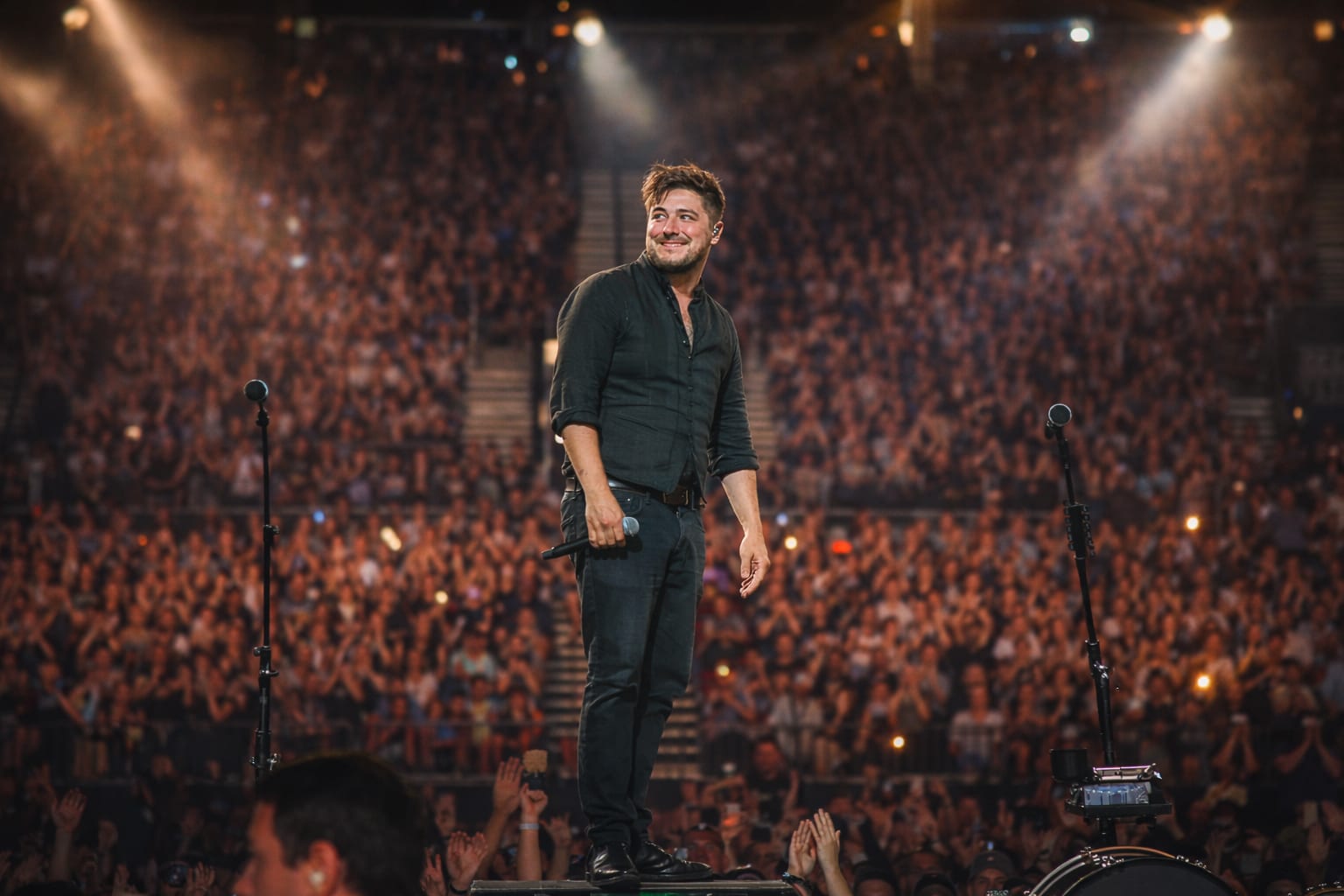 Mumford and Sons performing live, opening frame