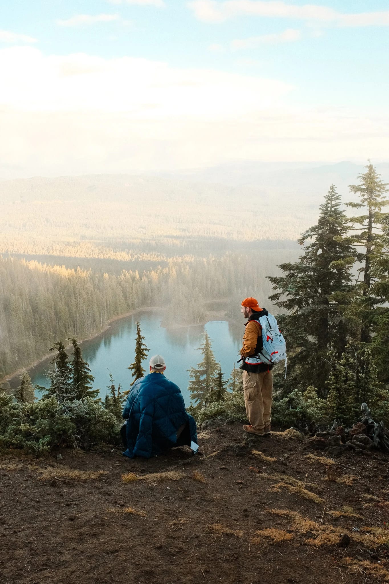 Hikers resting at a mountain viewpoint