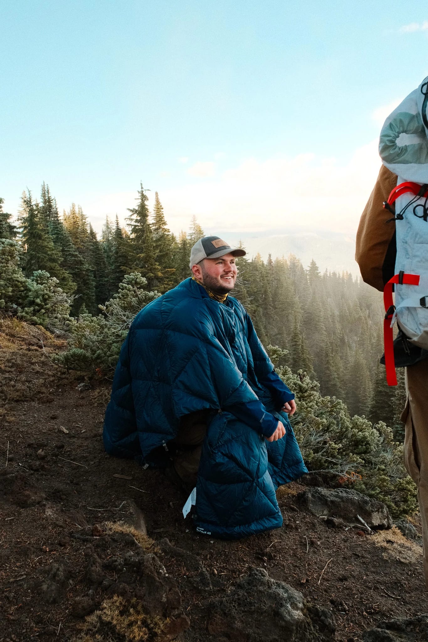 Hikers resting at a mountain viewpoint