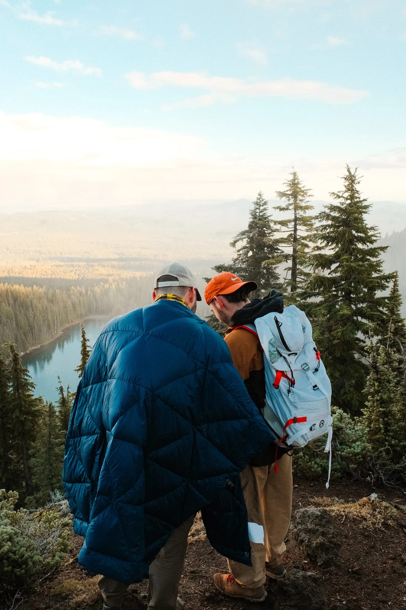 Hikers resting at a mountain viewpoint