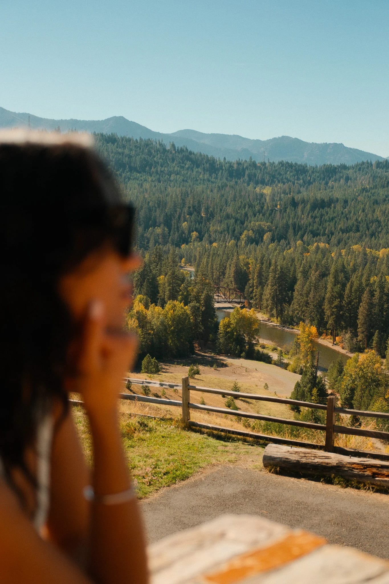 Guest taking in the mountain view from a terrace