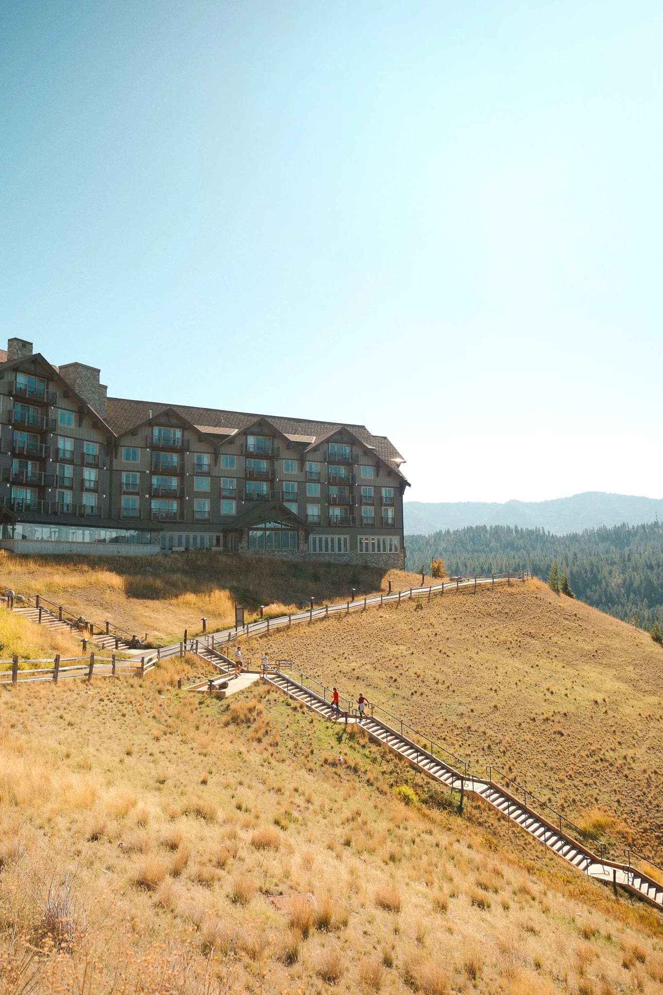 Suncadia lodge and grounds beneath a clear sky