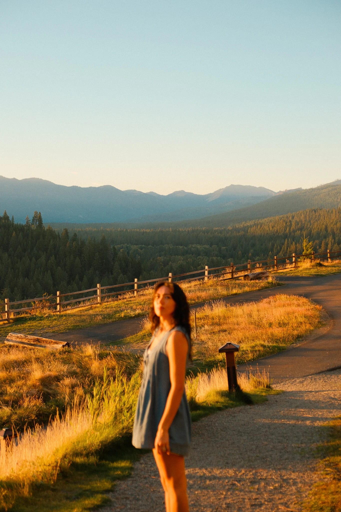 Guest overlooking the mountains in warm evening light