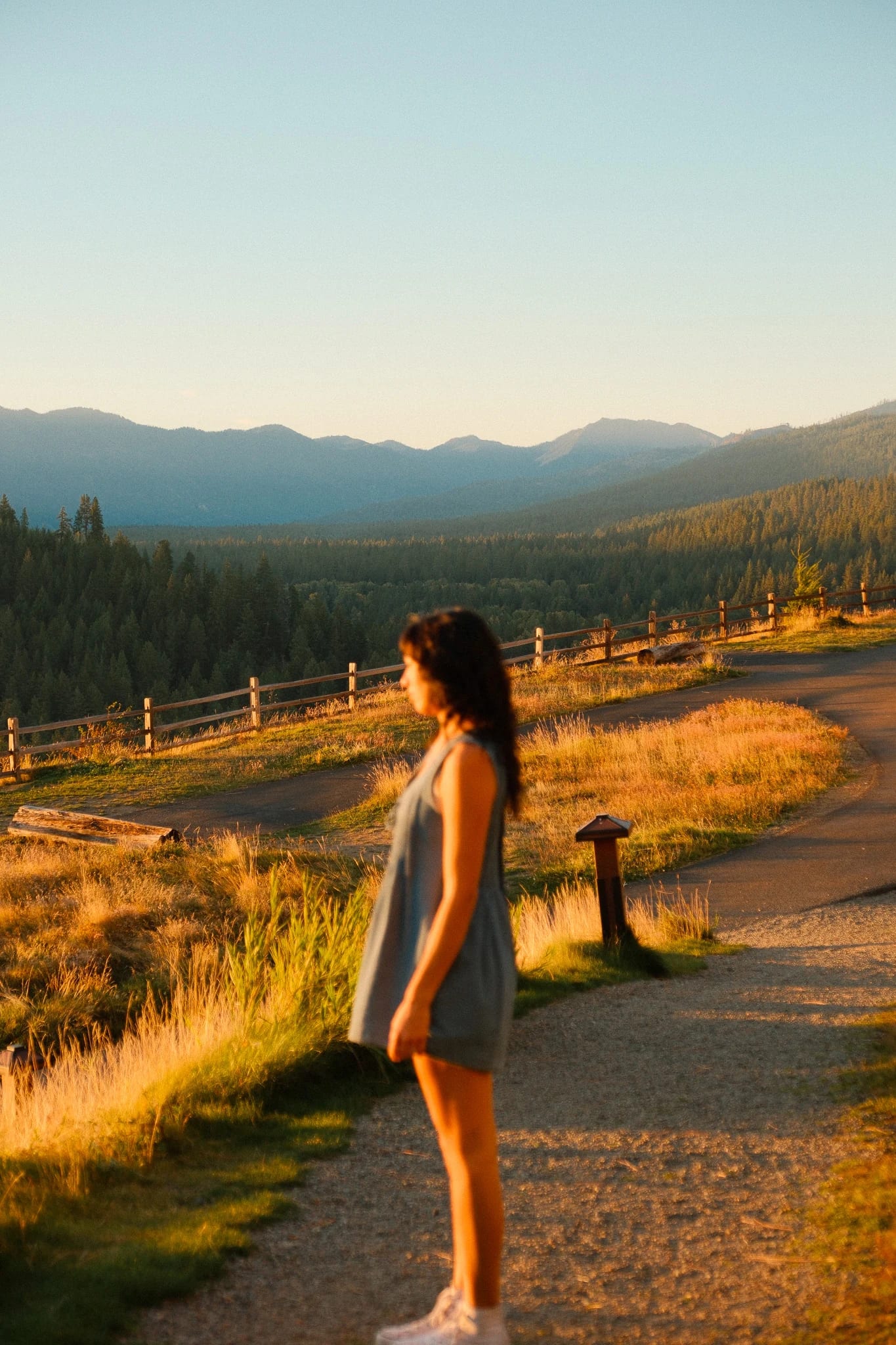 Guest on a Suncadia path at sunset