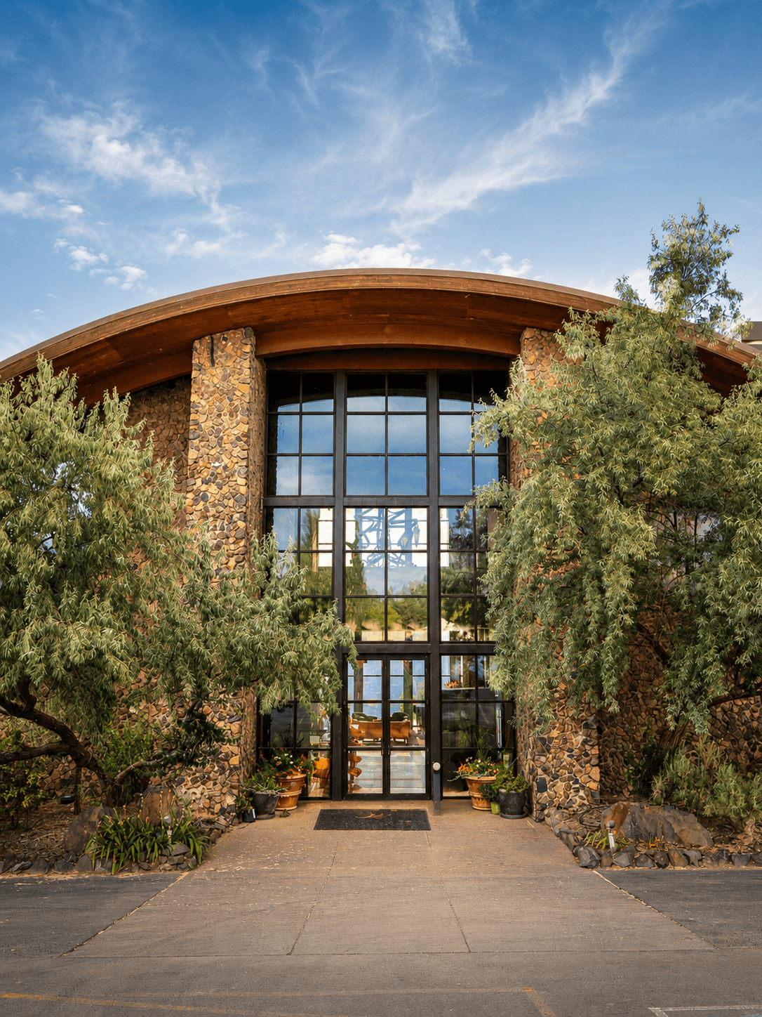 Curved stone entrance at Sage Cliff Resort