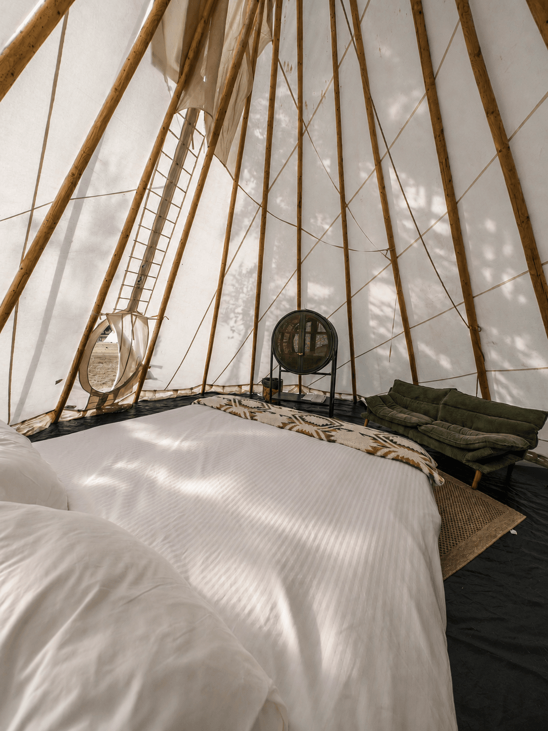 Teepee bedroom and canvas details at Sage Cliff Resort