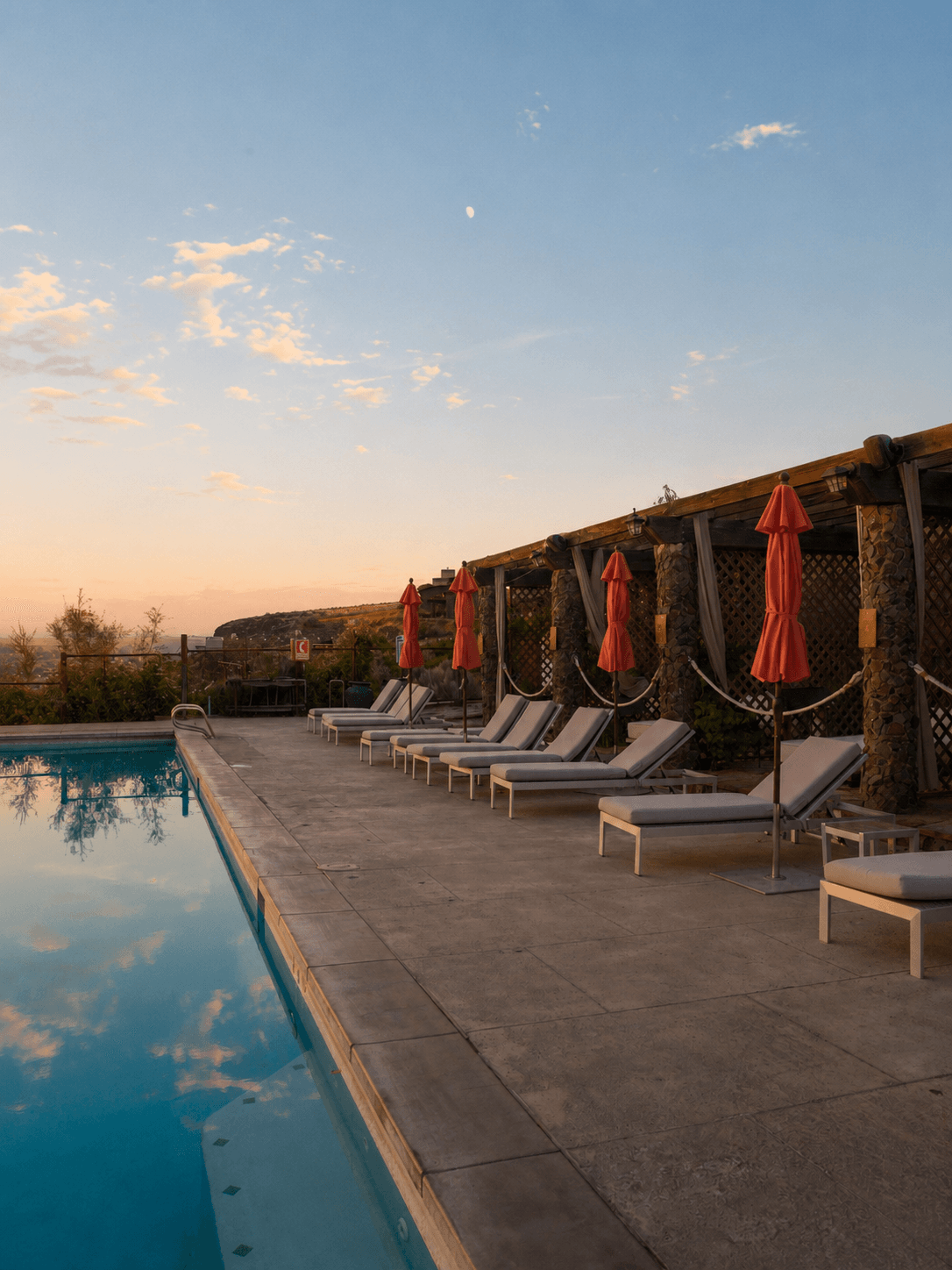 Pool deck and lounge chairs at Sage Cliff Resort