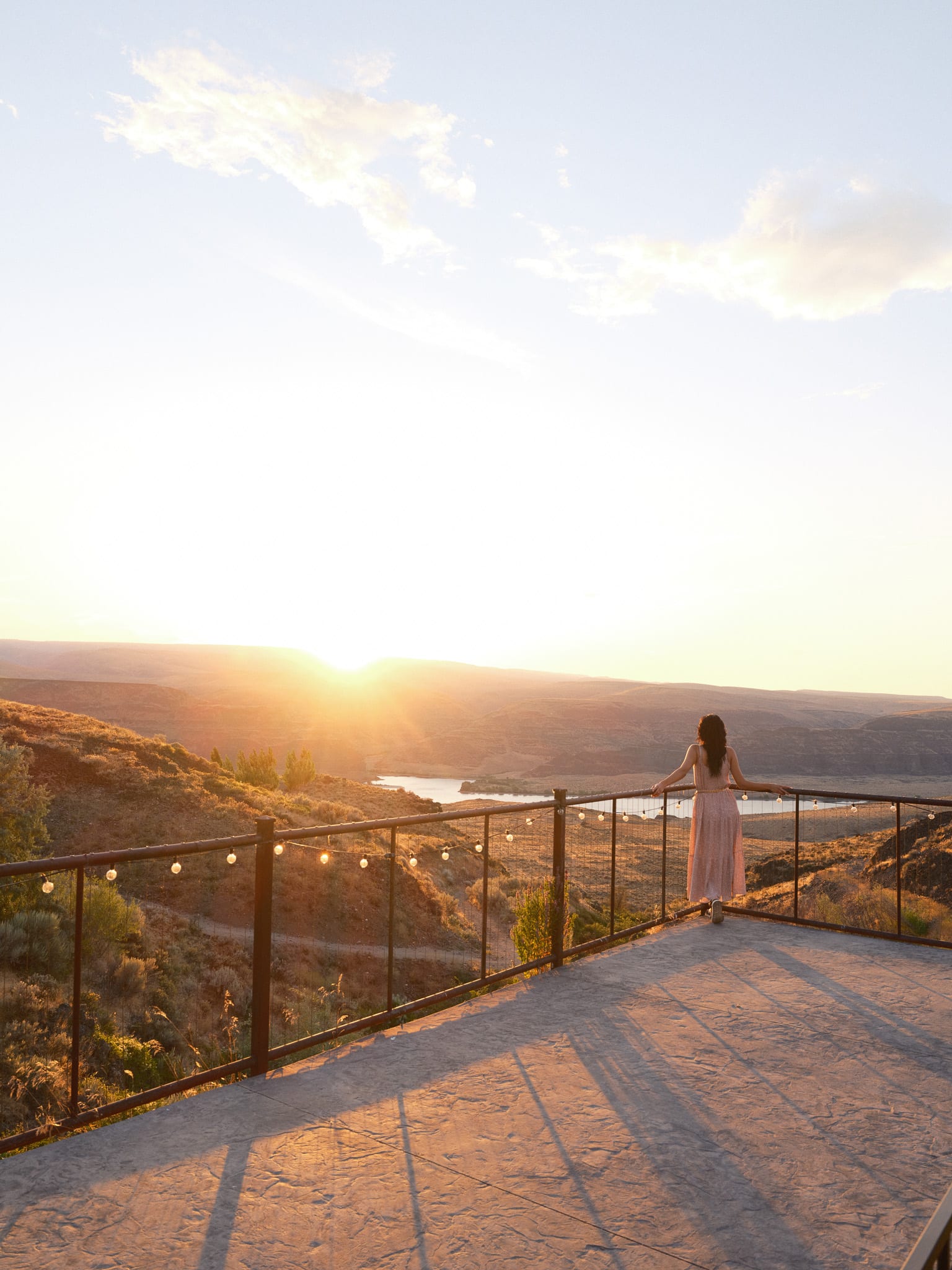 Guest watching sunset from the Sage Cliff Resort overlook