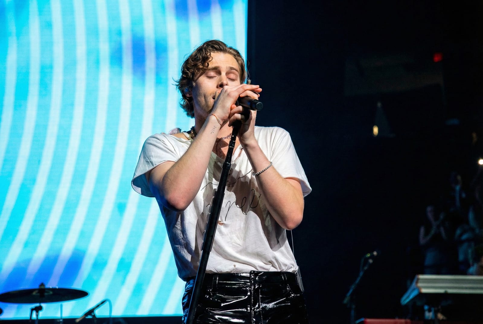 5 Seconds of Summer performing live, frame 7 of 8