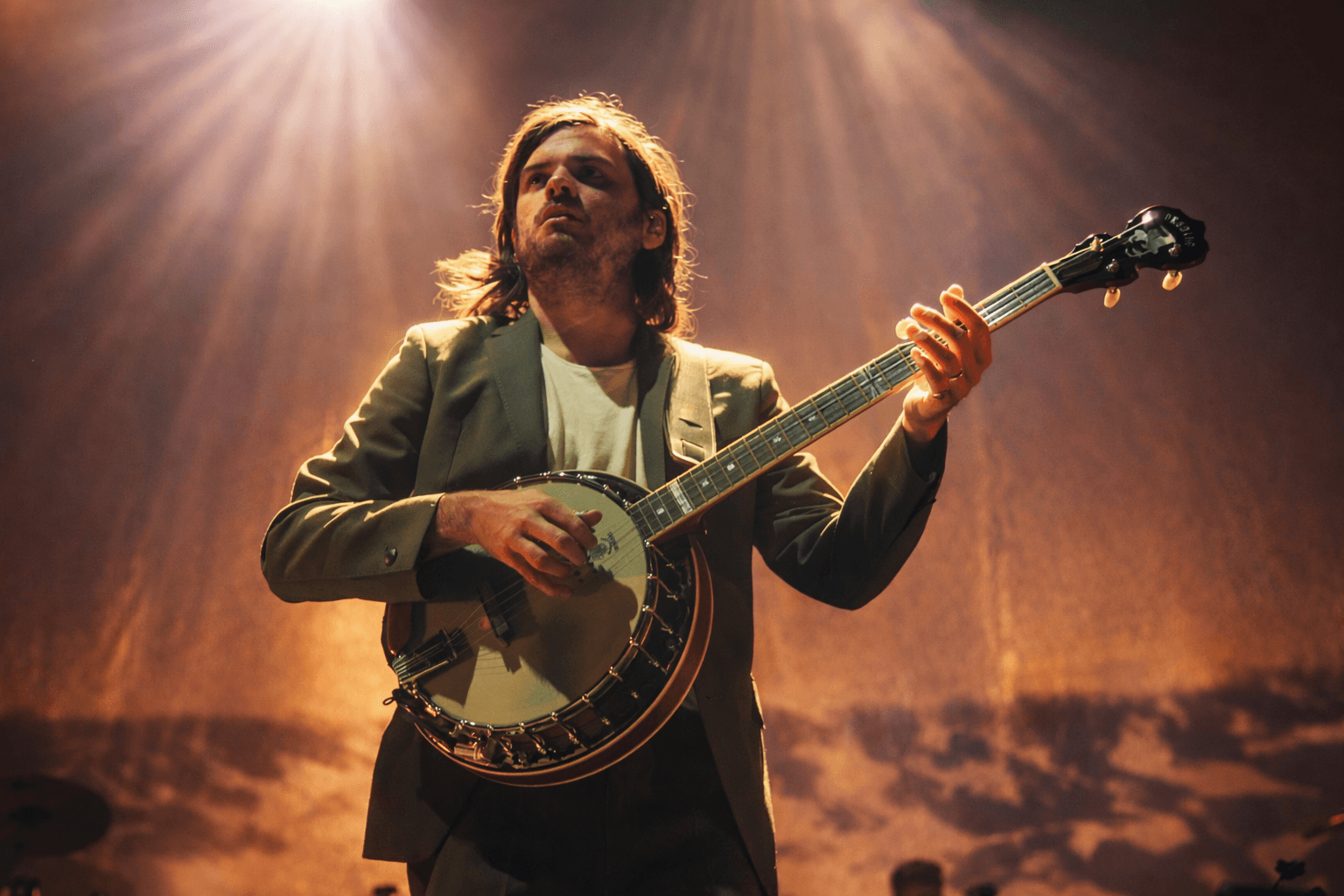 Mumford and Sons performing live, frame 2 of 7
