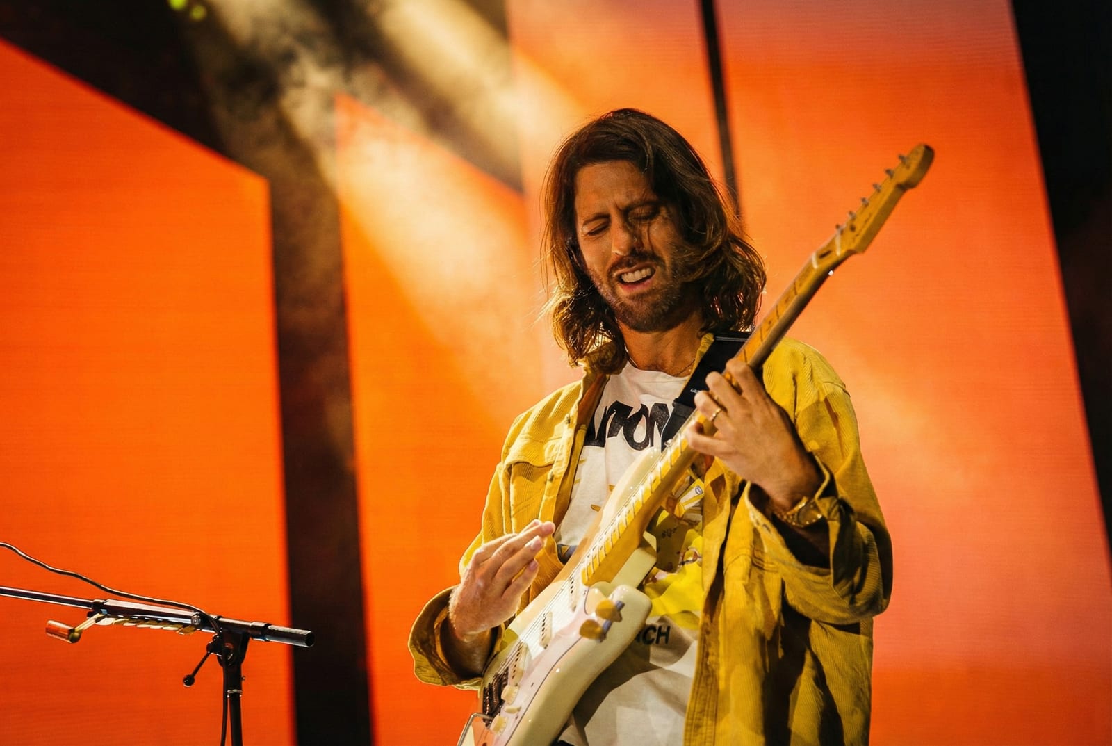 Imagine Dragons performing live, frame 16 of 18